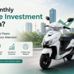 Ridoji electric scooter featured in a clean investment-themed banner with the headline “Best Monthly Income Investment in India?” alongside growth arrow graphics, monthly payout icons, asset-backed opportunity, and managed EV fleet benefits.